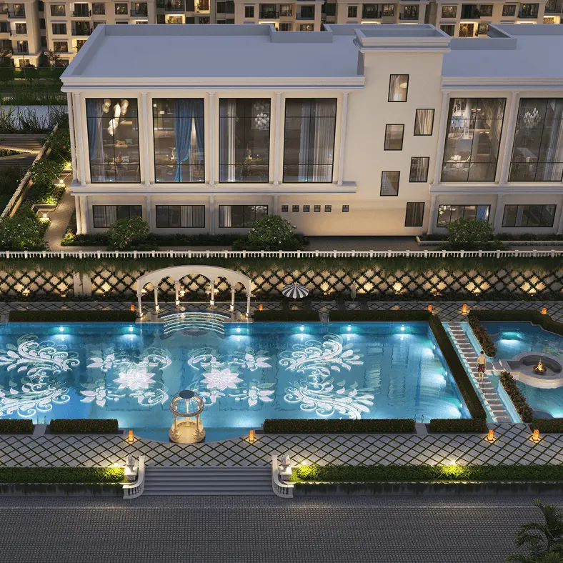 Sumadhura Edition, artistic impression The lit swimming pool and clubhouse terrace at dusk